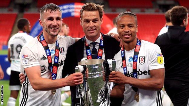 Joe Bryan, Scott Parker and Bobby Decordova-Reid with the play-off trophy