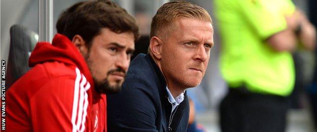 Pep Clotet and Garry Monk watching Swansea City in action