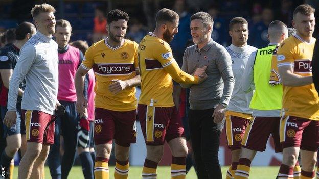 Motherwell players with manager Graham Alexander