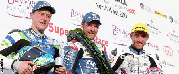 Alastair Seeley (centre) on the Superstock podium with Lee Johnston (right) and Dean Harrison