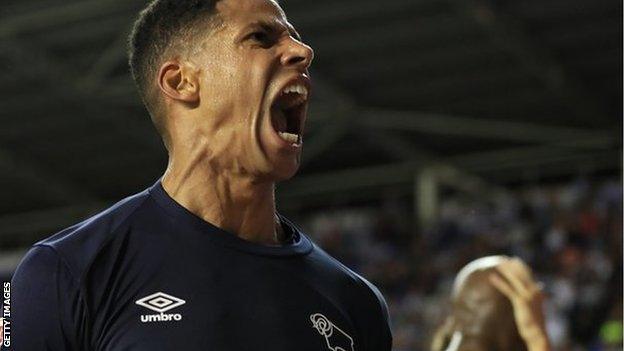 Curtis Davies screams in celebration of a Derby goal