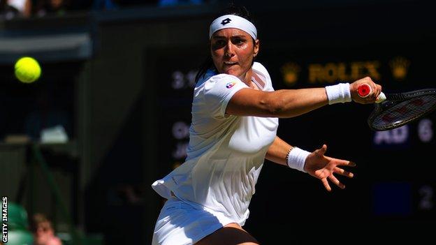 Ons Jabeur in action against Tatjana Maria in her Wimbledon semi-final