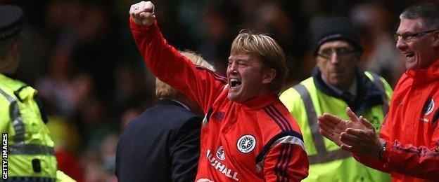 Stuart McCall celebrates victory over Republic of Ireland