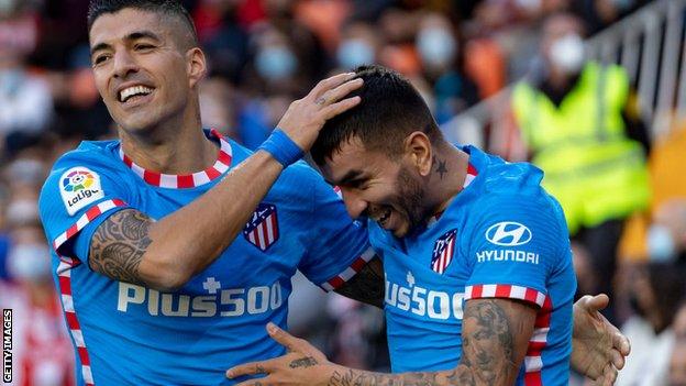 Atletico Madrid's Angel Correa and Luis Suarez