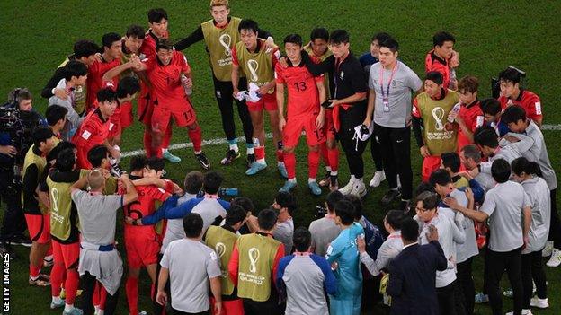 The South Korea players had to wait for the full-time whistle in the other match before they could celebrate