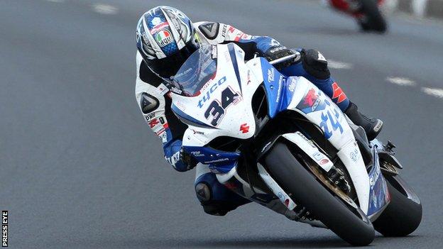 Alastair Seeley on the way to winning one of the Superbike races on a Tyco Suzuki at the 2012 North West 200