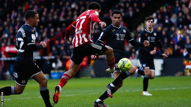 Morgan Gibbs-White scores