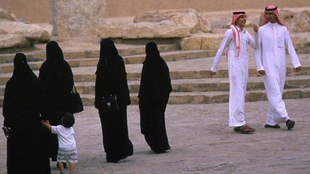 Women and men walks on the streets of Riyadh, Saudi Arabia. File photo