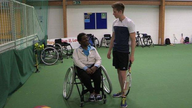 Goz and Ross on an indoor tennis court