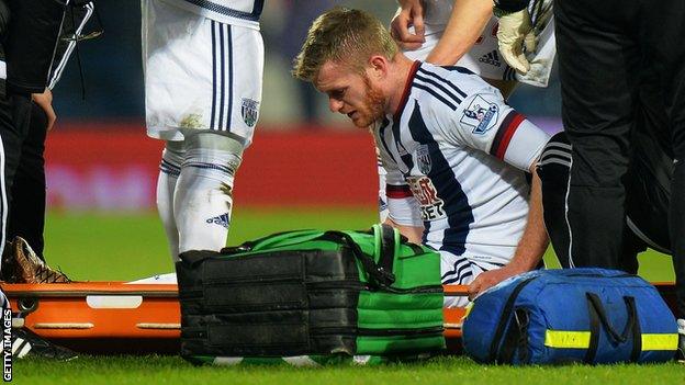 West Brom's Chris Brunt is put on a stretcher after being injured in Saturday's game against Crystal Palace