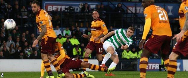 Celtic's James Forrest curls in the opening goal