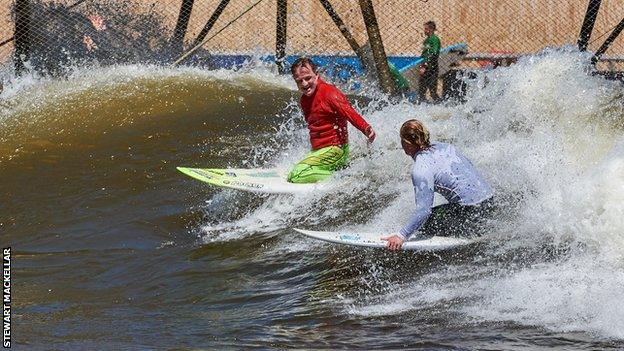 Mark 'Mono' Stewart (L) and Llywelyn Williams share a wave and a smile