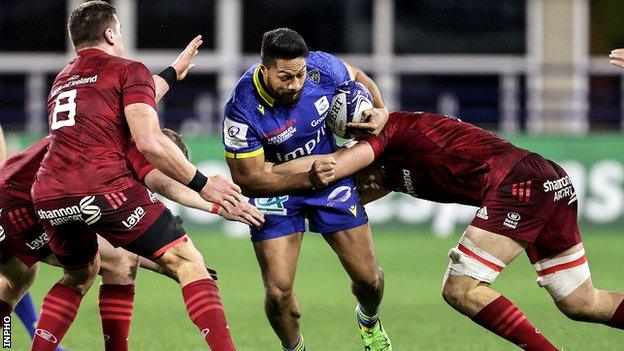 Clermont's George Moala is tackled by Gavin Coombes