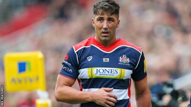 Bristol's Gavin Henson leaves the field with a shoulder injury