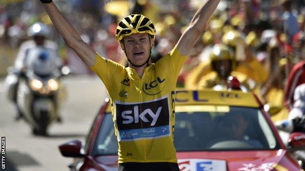 Chris Froome crosses the finish line first after winning stage 10 of the 2015 Tour de France