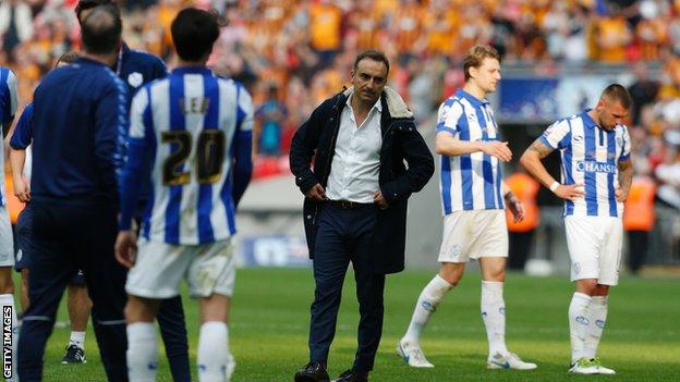 Carlos Carvalhal looks disappointed at Wembley after play-off final defeat to Hull City