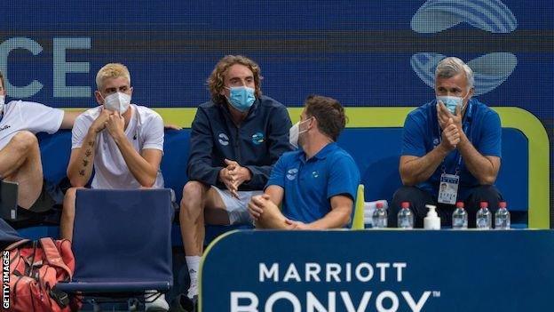 Stefanos Tsitsipas sits alongside Greece team-mates