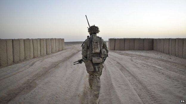 Soldier from the 1st Battalion Royal Regiment Fusiliers during a dawn foot patrol in Afghanistan