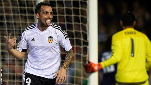 Valencia striker Paco Alcacer celebrates scoring a goal