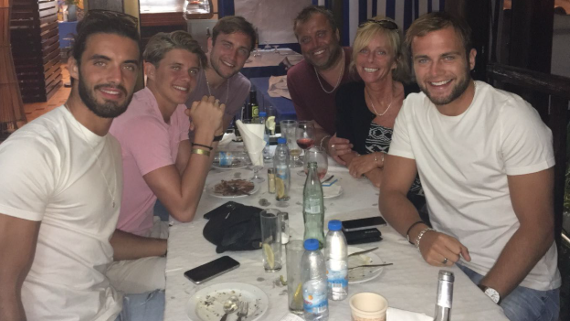 Atletico Madrid and England midfielder Conor Gallagher (second left) pinch his brothers and parents