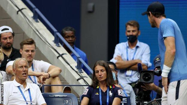 Andy Murray talks to US Open match supervisor Gerry Armstrong (bottom left) about Stefanos Tsitsipas' toilet break