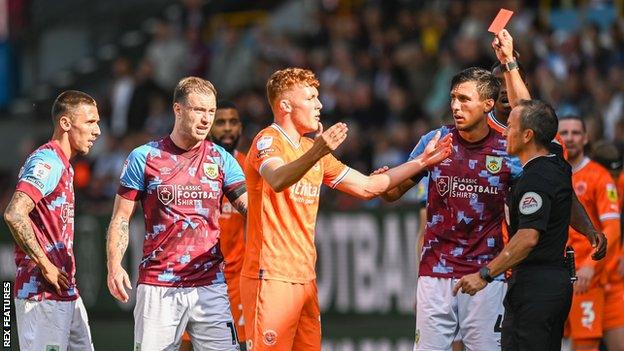 Sonny Carey was sent off in the 75th minute of Blackpool's 3-3 draw at Burnley on Saturday