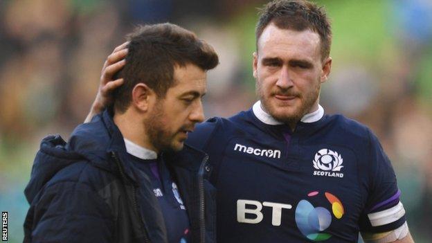 Stuart Hogg consoles Greig Laidlaw after Scotland's defeat