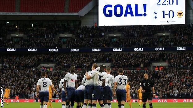 Tottenham players celebrate after scoring