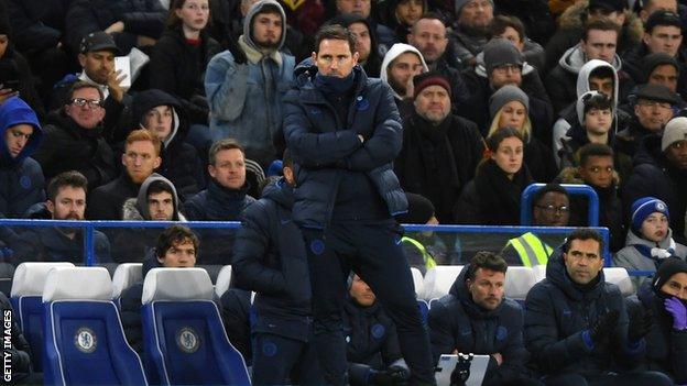 Frank Lampard stands alone on the touchline