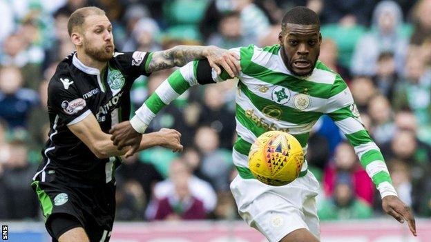 Celtic's Olivier Ntcham challenges Hibs' Martin Boyle for the ball