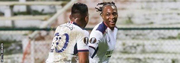 Joe Aribo celebrates with Alfredo Morelos after scoring the opening goal