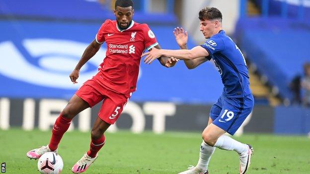 Liverpool midfielder Georginio Wijnaldum (left)
