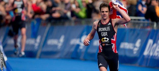 Jonathan Brownlee celebrates his win at the Stockholm triathlon in 2014