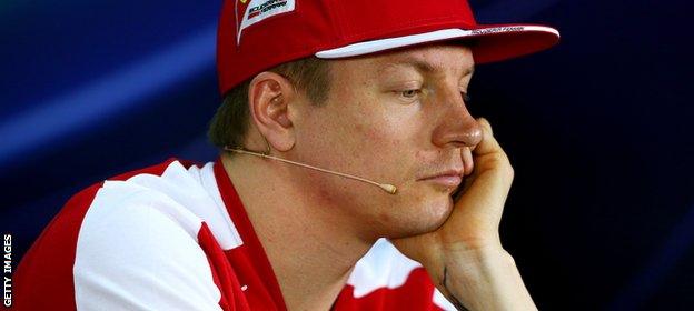 Kimi Raikkonen looks bored in a press conference