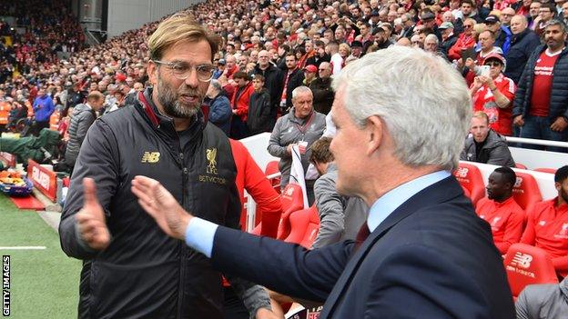 Jurgen Klopp greets Mark Hughes before Liverpool's win over Southampton