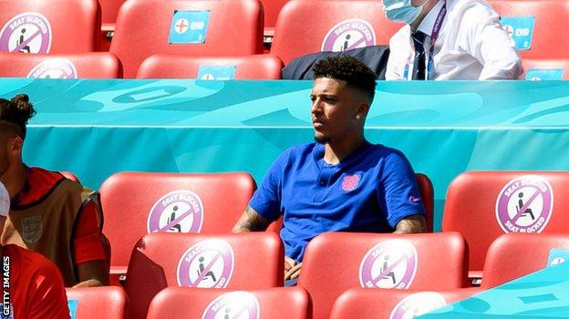 Jadon Sancho watches on against Croatia