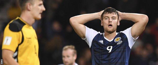 Scotland striker Chris Martin is left disappointed against Lithuania