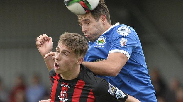 Gavin Whyte and Sean Ward fight out an aerial duel during the Crusaders and Linfield meeting in September