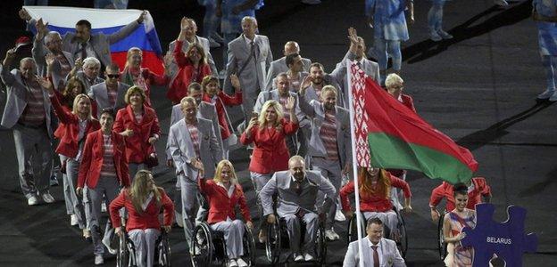 An athlete from Belarus carried a Russian flag into the opening ceremony before it was confiscated by officials, who are now working to identify the offender