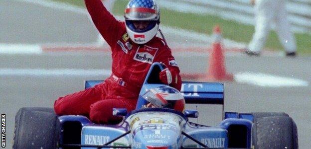 Jean Alesi is driven along by Michael Schumacher after winning the Canadian Grand Prix