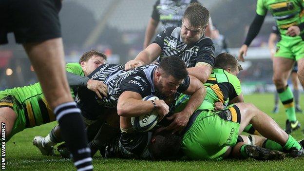 Rhys Webb dives over a ruck to score Ospreys' bonus point try against Northampton