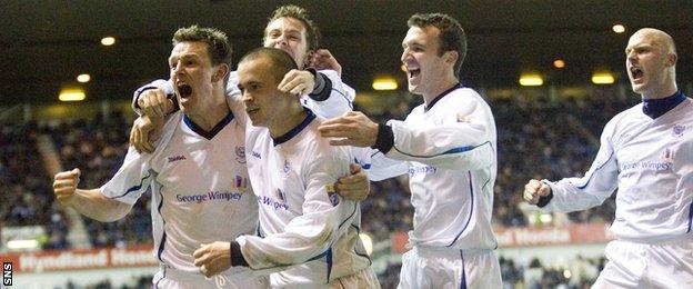 St Johnstone players celebrate scoring against Rangers during a 2-0 win at Ibrox in 2006