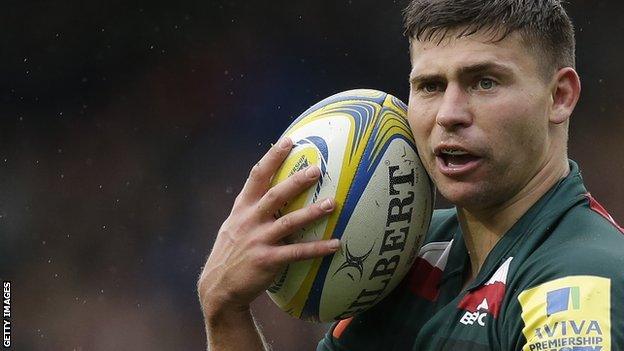 Ben Youngs holds the ball to his face