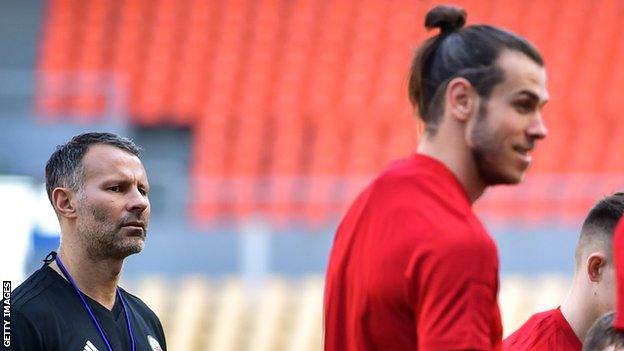 Ryan Giggs watches Gareth Bale at Wales training in China