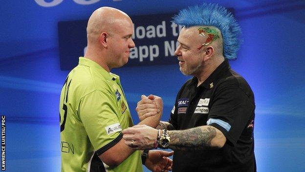 Peter Wright congratulates Michael van Gerwen