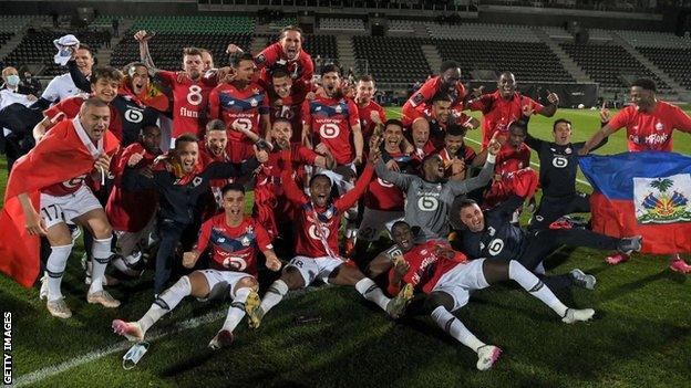 Lille players celebrate