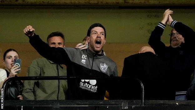 Port Vale manager Darrell Clarke celebrates