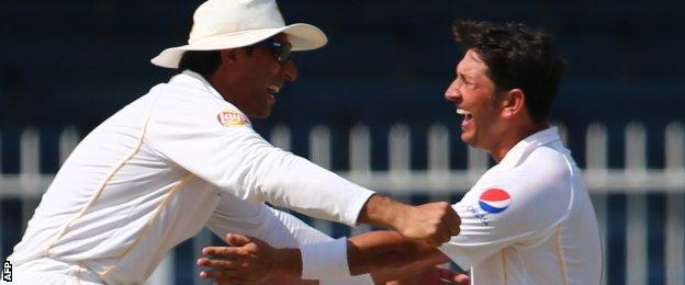 Pakistan captain Misbah celebrates with Yasir Shah, who took 15 wickets in two Tests