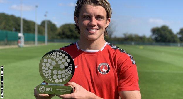 Conor Gallagher with the EFL Young Player of the Month award for August