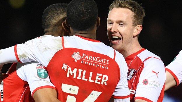 Mickel Miller mobbed after his penalty